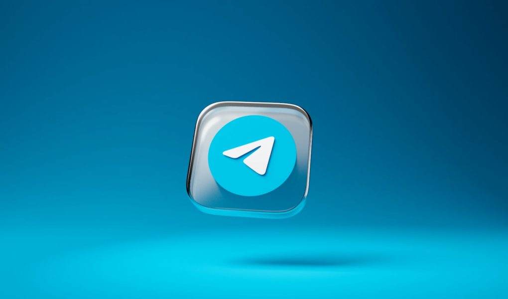 a blue button with a white arrow on it
